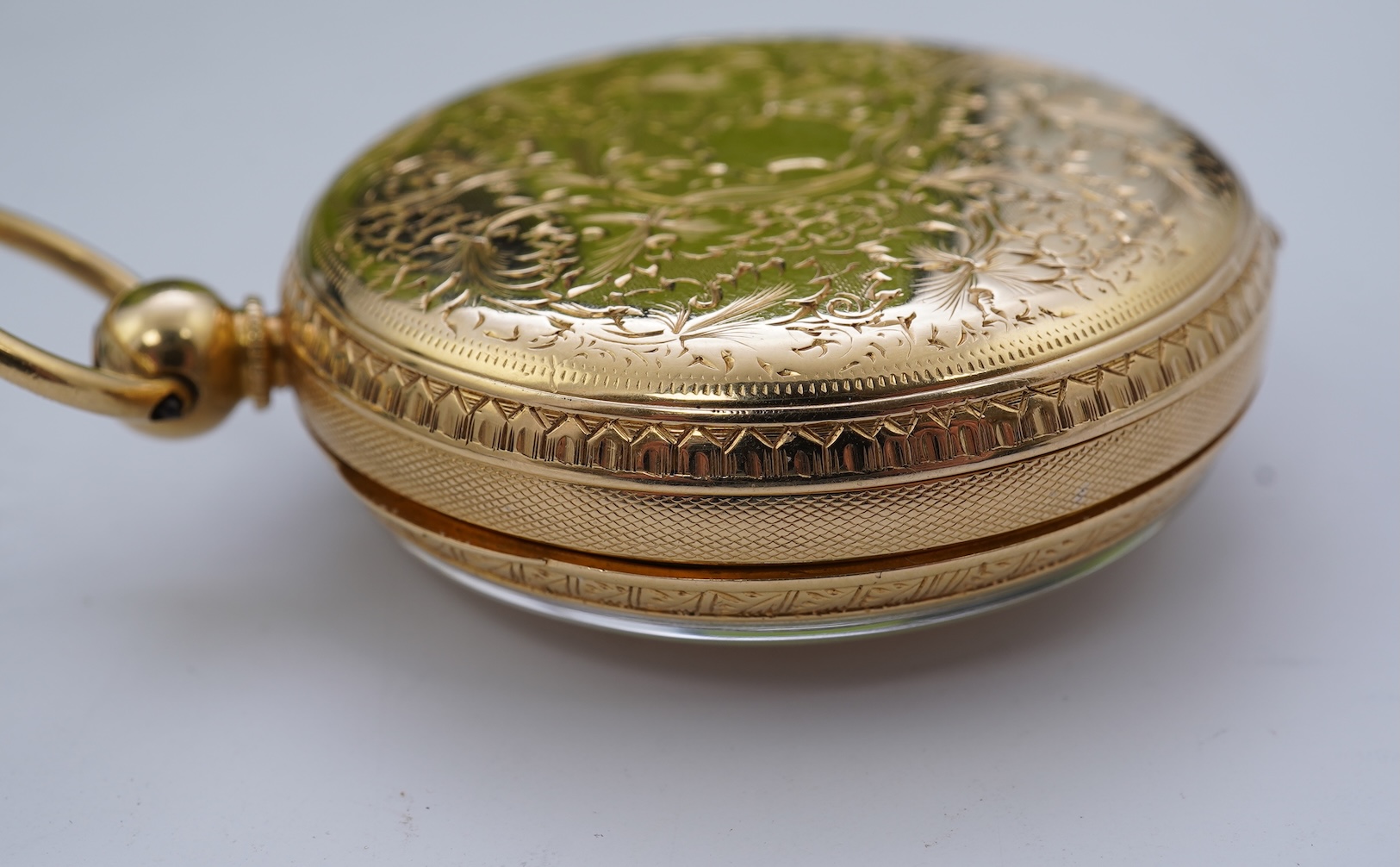 A Victorian engraved 18ct gold open faced key wind pocket watch